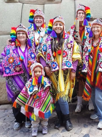Family wearing colorful Andean clothing in Cusco