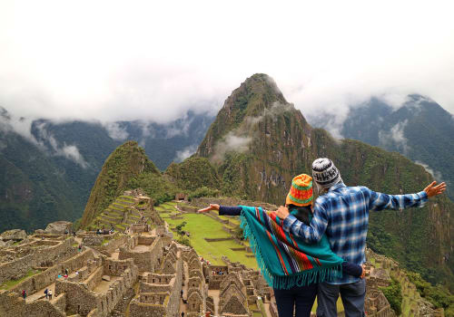 Couple,Admiring,The,Spectacular,View,Of,Machu,Picchu,,Cusco,Region,