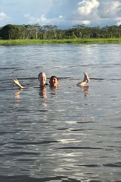 Couple Swimming In The Amazon