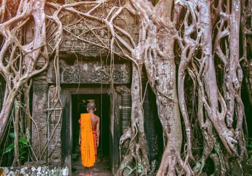 monk walking into a temple